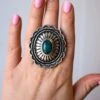 CONCHO AND DARK TURQUOISE OVAL RING- SIZE 7