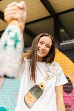 QUEEN OF SPARKLES WHITE CHAMPAGNE TEE -Western Cowboy Clothing Store image 720x 522b4daf 11bd 464e ba4f b15fd5c16a79